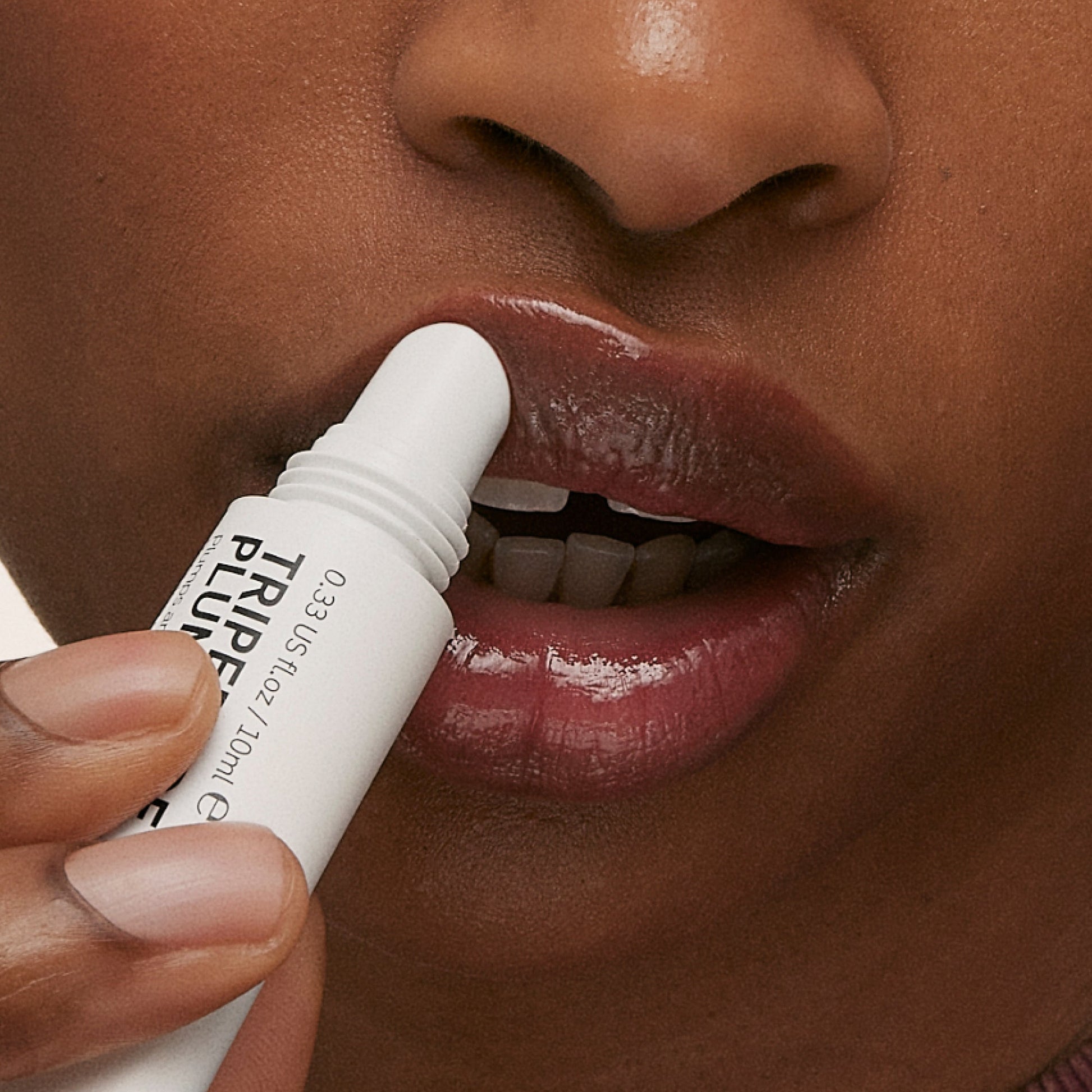 tripeptide-plumping-berry-lip-balm-p3 ApplicationBerry.jpg